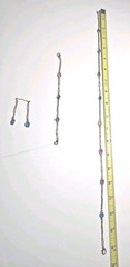 Mid Century 60′ 80′ gold-tone paperclip-style chainoval bezel-set colored Glass