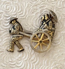 Vintage damascene man pulling couple in rickshaw brooch Made in Spain