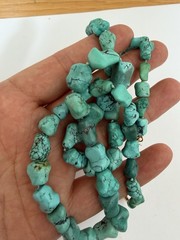 vintage necklace genuine turquoise nuggets paired with a 14K gold clasp 23” B5