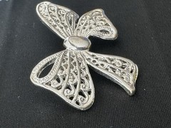AAI Silver-tone Ribbon Bow Brooch Featuring Intricate Openwork Filigree Details.