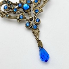 Vintage Victorian Revival Blue Glass Dangle Brooch Moonglow Cabochon Brass Pin