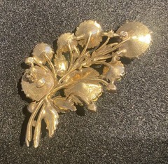 Vintage Brooch Featuring a Bouquet of Iridescent Rhinestone Flowers