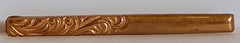 EDWARDIAN BAR PIN EMBOSSED BRASS W/ ROLLED GOLD? TOP