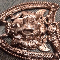 Silver Tone Shield Pin with Raised Animal Head Design, No Stone