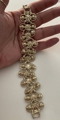 Vintage Gold Tone multi-gemstone link bracelet with a fold-over clasp 7’ in