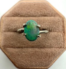 0.66ct Black Opal Oval Cut 7.3 x 5.2 mm