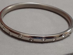 Crystal polka dot bangle bracelet Silvertone flush set stones eternity band