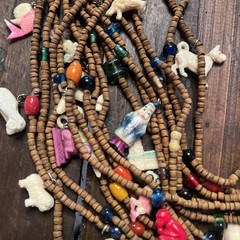 Vintage one of a kind wood bead Necklace w/ tons of celluloid charms unique cool