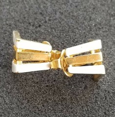 VINTAGE 1955-1969 TRIFARI GOLD TONED METAL AND WHITE ENAMEL CLIP ON EARRINGS