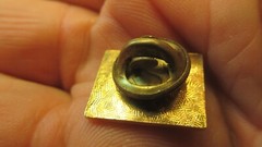 letters logo c d n lapel pin