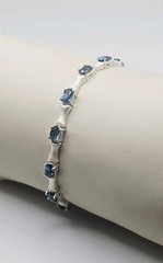 Sterling Silver 3.25ct Blue Topaz Matte Finished Bone Link Tennis Bracelet 7.5″