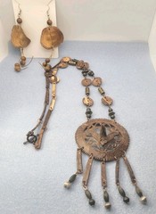 A set of tribal-style wooden and metal jewelry pendant necklace 26in Earrings.