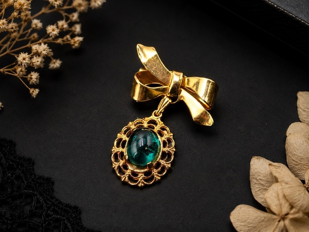 Vintage Gold Tone Bow Brooch with Emerald Green Glass Cabochon Dangle