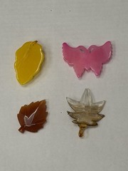 Lot Of 4 Vintage-style translucent plastic leaf and butterfly pendants/jewelry