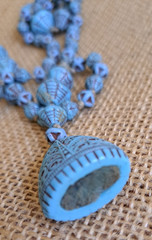 Neiger Brothers deco glass turquoise blue spiderweb flapper necklace with fob