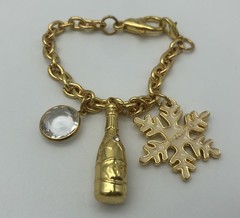 Vintage Juicy Couture Gold Tone Snowflake Champagne Bottle Bag Charm Bracelet