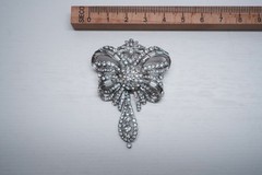 Vintage brooch Gablonz rhinestone bow silver-toned 6.5 cm.