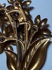 Vintage flower brooch gold tone C Clasp stamped brass red stones prong set