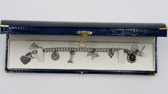 Vintage Sterling silver 925 dog bracelet with nine charms from 1995-1996