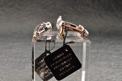 Near mint, gold and Cufflinks and silver tie clip, “Yves Saint Laurent”, case.