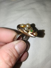 vintage snake ring with cultured pearls and small green emerald eyes.