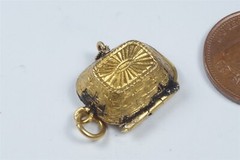 ANTIQUE GILT ENAMEL EGYPTIAN OPENING MOSES BASKET CHARM c1920