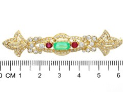 0.93ct Emerald, 0.24ct Ruby and 1.04ct Diamond, 18ct Yellow Gold Brooch