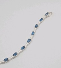 Sterling Silver 3.25ct Blue Topaz Matte Finished Bone Link Tennis Bracelet 7.5″