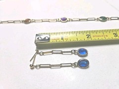Mid Century 60′ 80′ gold-tone paperclip-style chainoval bezel-set colored Glass