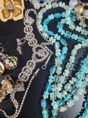 Vintage jewelry set of 26 in vintage purse