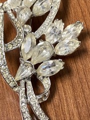 vintage rhinestone floral spray brooch, similar to designs from the 1940s-1950s