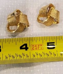 7/8 Inch Gold Tone Semi-textured 3 Dimensional Bow Clip On Earring