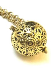 Filigree Aromatherapy Diffuser Necklace.