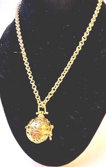 Filigree Aromatherapy Diffuser Necklace.