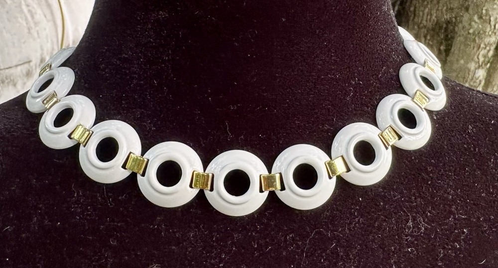 vintage Monet choker necklace featuring white enamel rings joined by gold tone