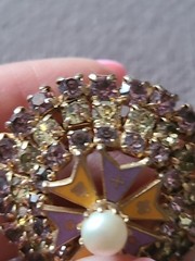 Brooch/pendant in lavender & yellow prong set rhinestones. Dome shape. Vintage