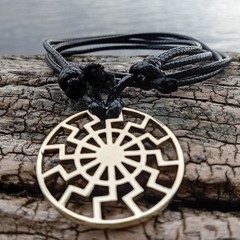 Black Sun Pendant Necklace – Brass Sonnenrad Medallion on Black Cord