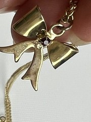 Vintage Gold Tone Necklace & Bow Shaped Pendant with Red Rhinestone