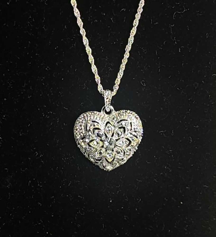 Vintage Sparkling Silver Toned Avon heart pendant with rhinestones