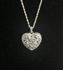 Vintage Sparkling Silver Toned Avon heart pendant with rhinestones