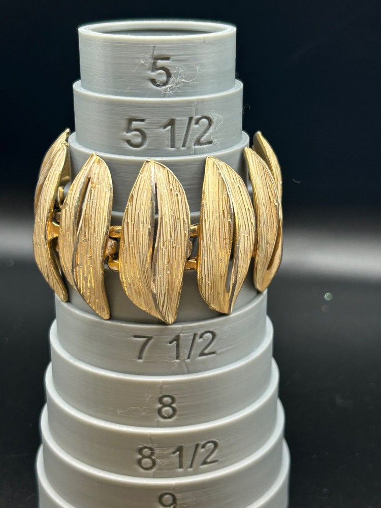 VINTAGE ART ARTHUR PEPPER BRACELET GOLD TONE WITH WHITE FOLD OVER CLASP SIGNED