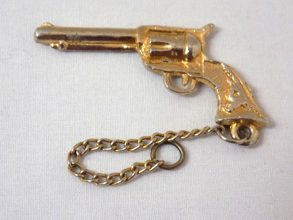 Vintage 1940s 1 3/4 Inch Gold Tone Six Shooter Charm On Two Inch Chain