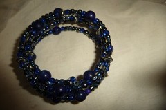 #1427A BRACELET SPIRAL 1″ W ROWS of BLUE & GRAY GLASS BEADS