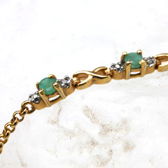 Tiny delicate Gold tone chain links 6 3/4″ Bracelet w/4 round Peridot stones