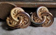 Vintage Costume jewelry clip on earrings 1980s 1990s Iridescent Gold Tone Knots
