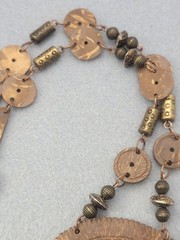 A set of tribal-style wooden and metal jewelry pendant necklace 26in Earrings.