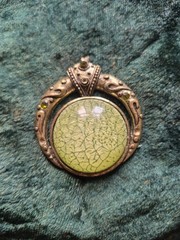 Ornate Bronze Green Cracked Glass Pendant Necklace