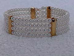 Vintage 4 Strand Faux Pearl Goldtone Tension Cuff Bracelet 7.5 in