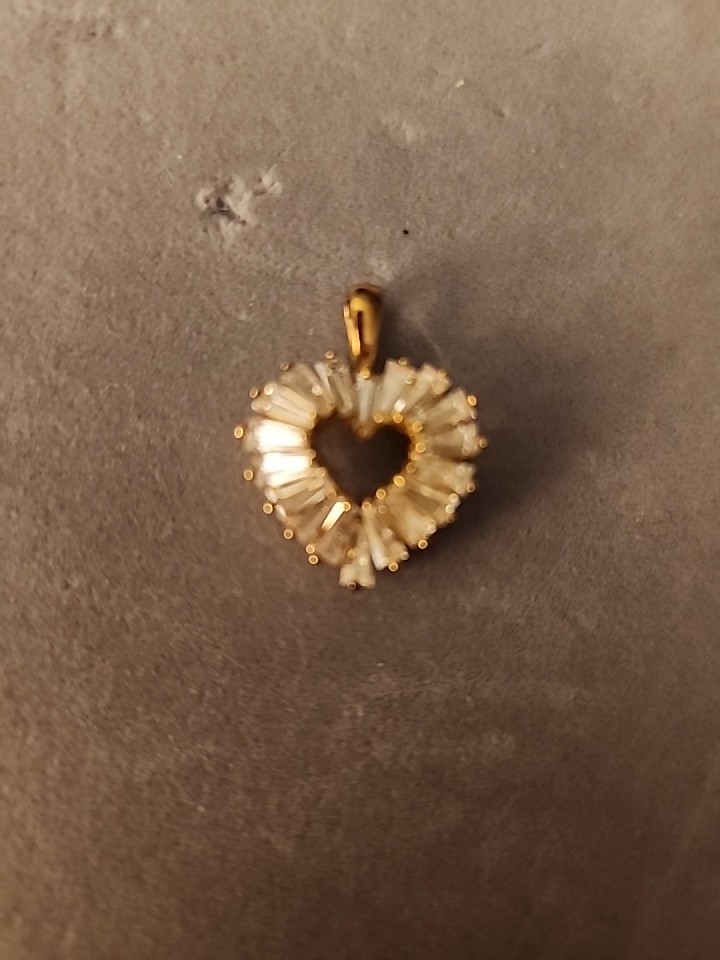 Vintage Style Gold Tone Heart Pendant with Baguette Cut Clear Stones .