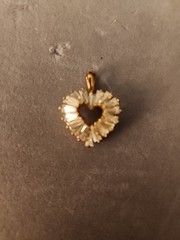 Vintage Style Gold Tone Heart Pendant with Baguette Cut Clear Stones .